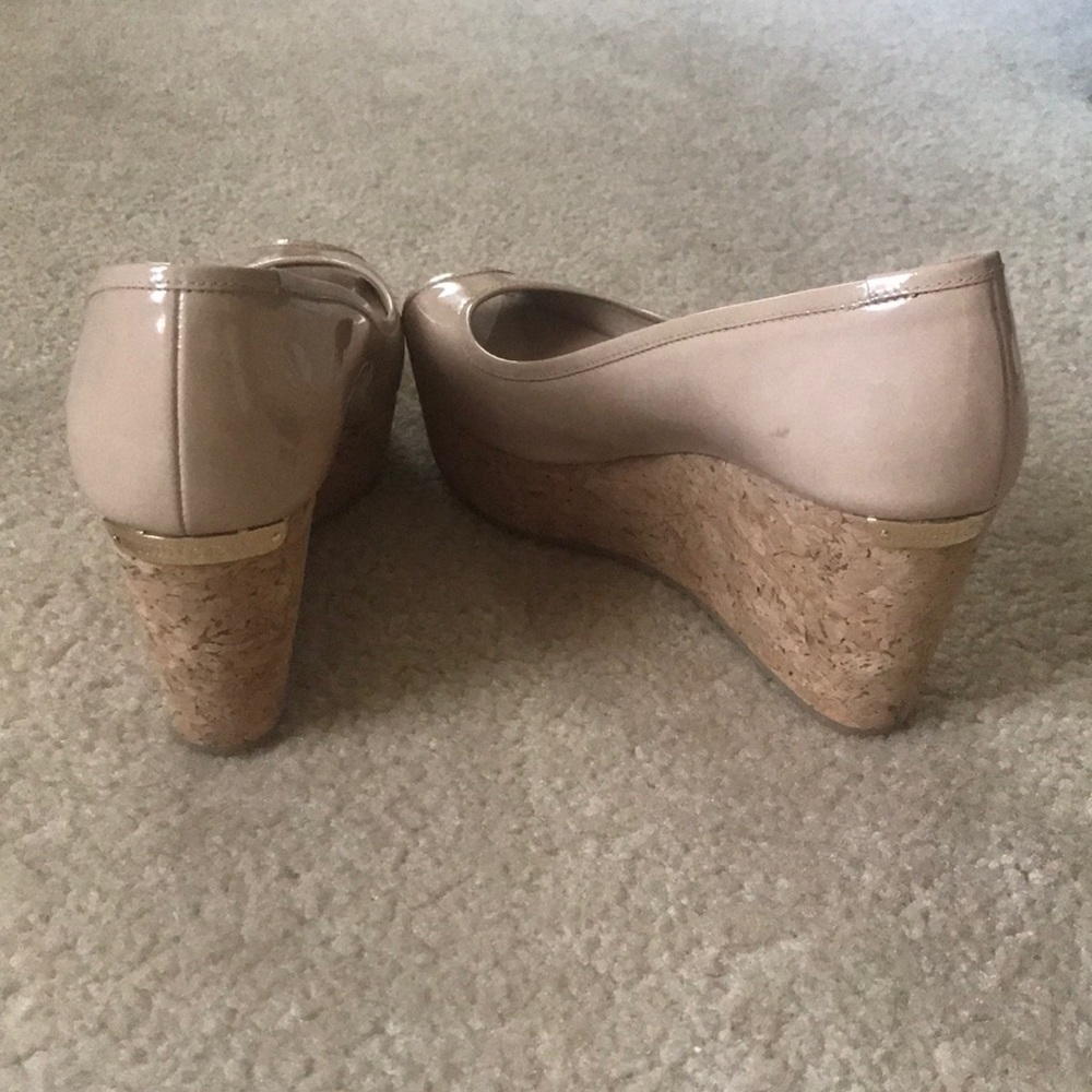 Nude patent leather cork wedge by Jimmy Choo